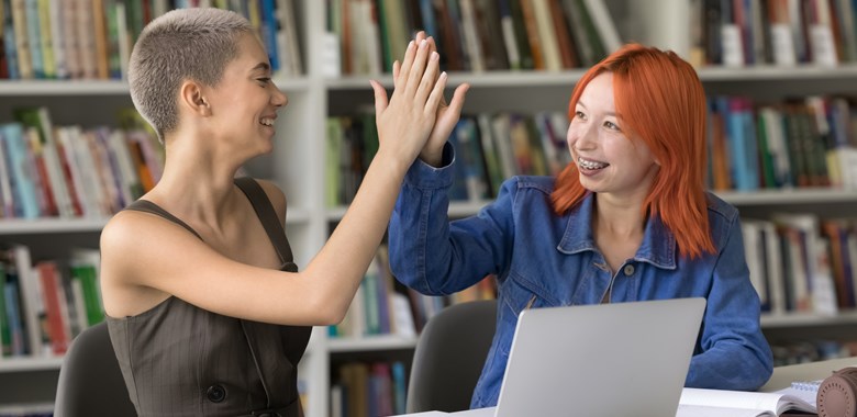 Mp64539375 Two Students Pretty Redhead And Blonde Girls Giving High (1)